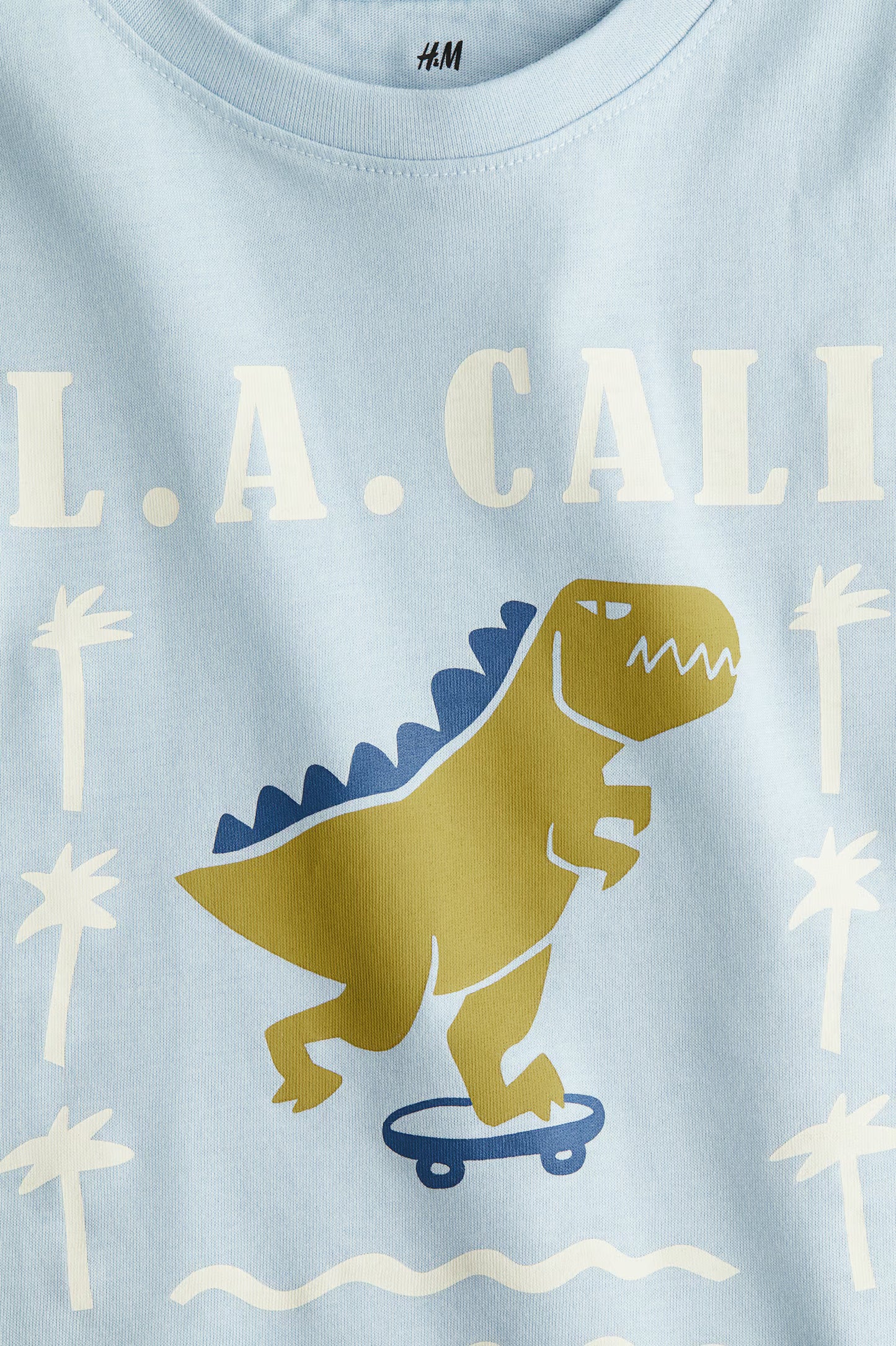 Playera resacada de algodón para niño marca H&M