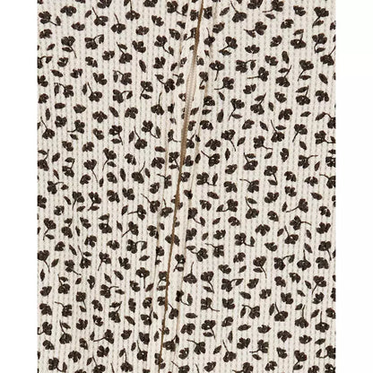 Mameluco de algodón para niña marca Carter's